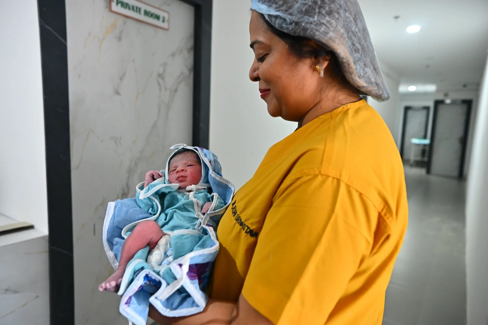 Mother and baby representing Blossom mother and child care in Ranchi
